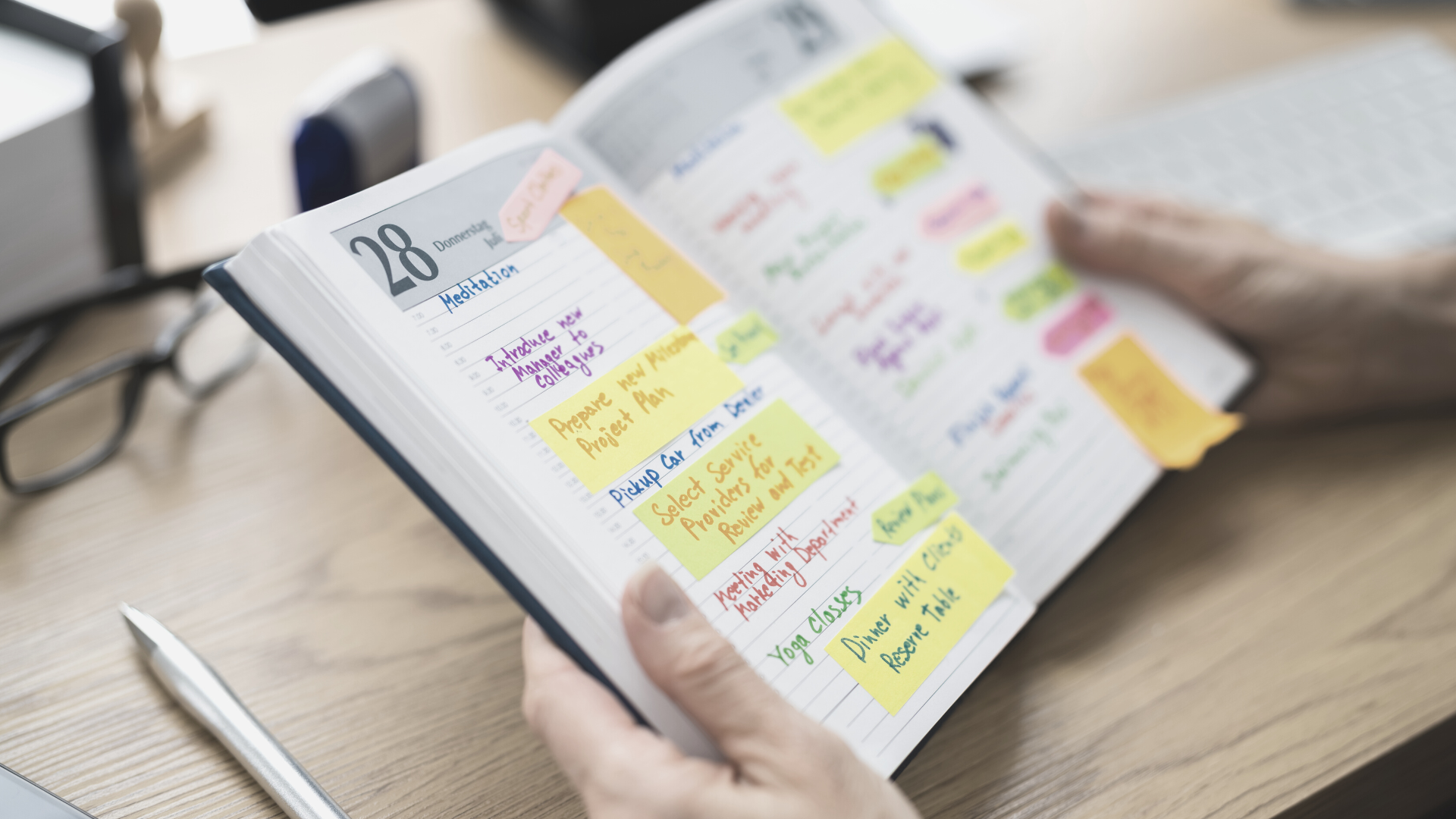 Therapist holds a colour coded diary