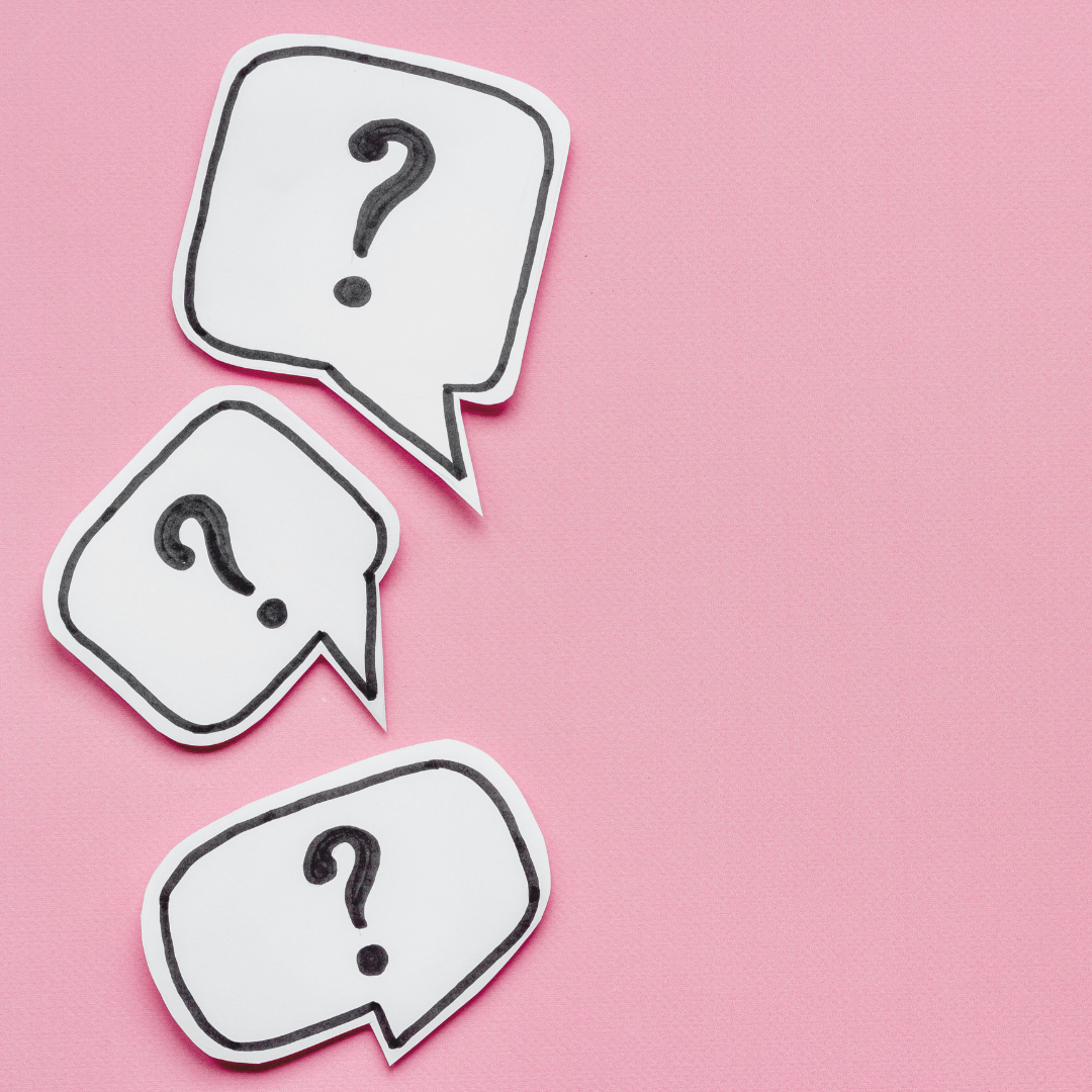 White paper speech bubbles with questions marks in them, against a pink background.