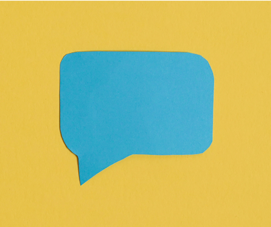 A blue speech bubble against a yellow background